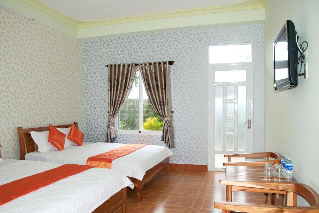 Sunrise Village Hotel موي ني الغرفة الصورة